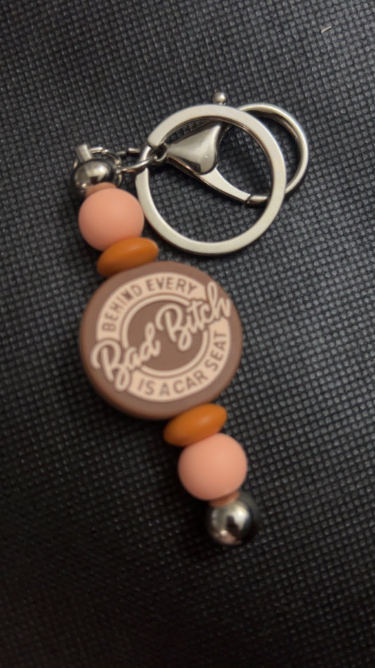 Behind Every Bad     B!tch Keychain